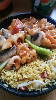 Chicken in garlic sauce with pork fried rice lunch special.