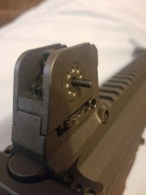 Parts that fell off their gun after 2 magazines.