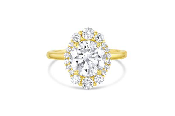 A gorgeous custom design with a stunning round brilliant diamond center.