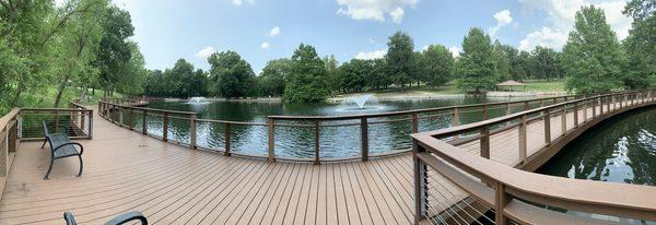 A section of the bridge that goes around the pond.