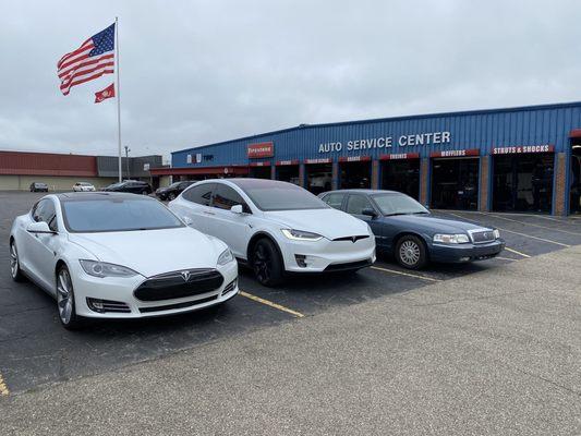 Getting brakes done on a car with 104,000 miles! And our other car getting new summer tires with our new black rims.