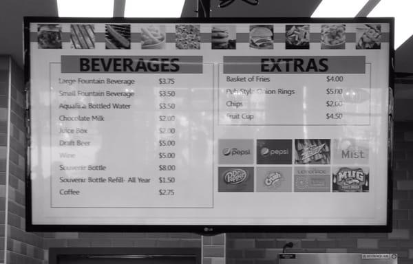 Beers are Bud Light, Blue Moon and Boulevard Wheat. Two wine choices are personal sized bottles of Barefoot Red or Barefoot White.