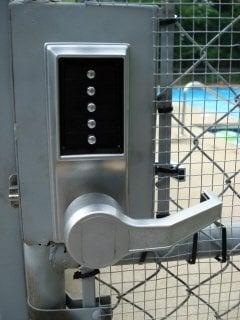 Kaba L1000 Series installed at a swimming pool gate