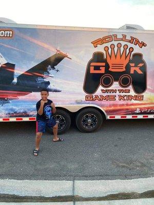 My son in front of the truck.