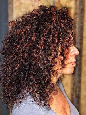 Naturally curly hair featuring Deva Curl Products!