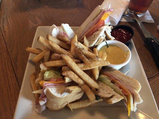 Turkey club sandwich - nom nom, comes with honey mustard.