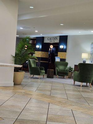 Gaudin restaurant to your left as you enter the lobby