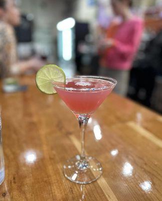 Our popular Cosmo on our handmade 38 foot cherry wood bar!