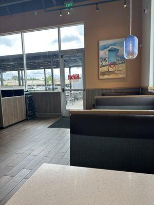 Some booths over looking the outdoors eating area.