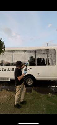 Foam cannon pre-wash on a customer's shuttle bus.