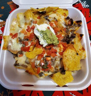 Super Nachos with carne asada