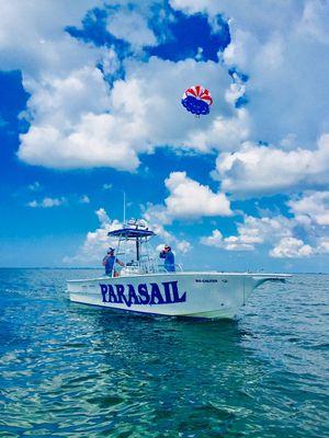 Our six-passenger winch boat the "Six Chuter" keeps our parachutes flying high!