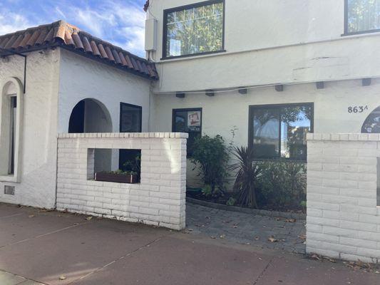 Front door entrance at:
863 B Grant Ave. (left side)