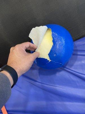 Ripped dodge ball ball.