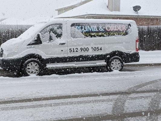 Plumbing van during the snow storm.