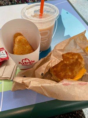 egg and cheese biscuit + hash browns (smoothie is from jamba juice nearby)