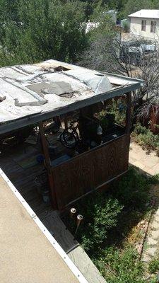 Before pic of a roof over back porch.