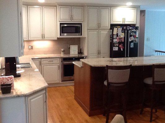 The same kitchen. It included new appliances, cabinets, countertops and new hardwood floors. Custom LED lighting throughout.