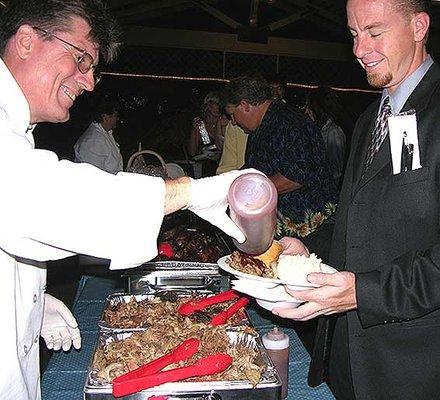 Staff Serving from Buffet Line