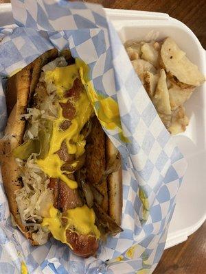 Single bratwurst w/ mustard, garlic, onions and sauerkraut AND a side of German potato salad.