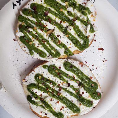 Locally made, organic bagel with cream cheese and our house made vegan Mac nut pesto