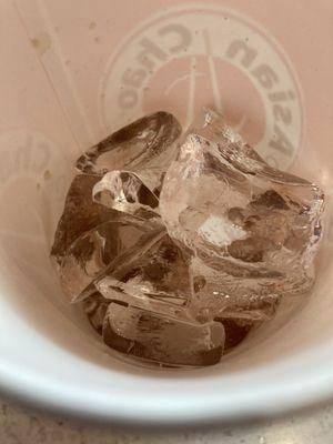 A cup of ice with a little soda.....guy at the counter says "standard"