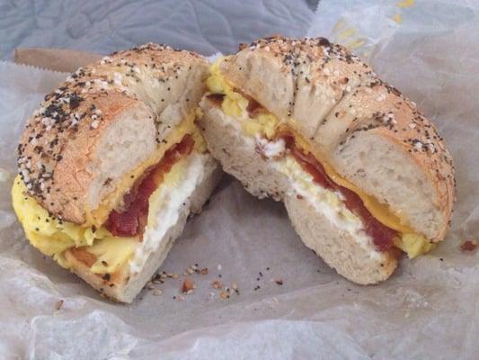 Bacon, egg, cheese and cream cheese on an everything bagel