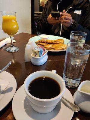 Drip coffee, orange juice, bleu cheese quesadilla