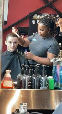 Kaylin giving hair cut