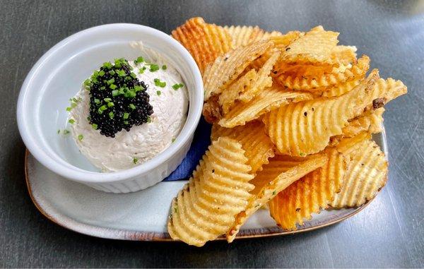 Warm chips with Vermont crème fraîche and bowfin caviar.