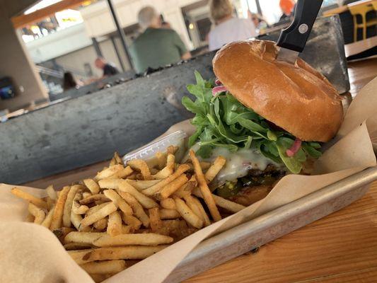 Rockin "W" Burger 1/3 bf patty, pepperjack cheese, pickled onions, caramelized jalapeño's, bbq sauce, organic arugula on challah bun. Fries.