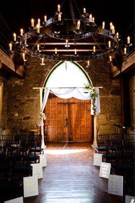 Chairs placed for ceremony. We brought our own Arch and decor in for this.