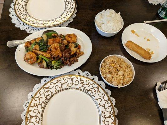 Triple delight, fried rice, steamed rice, and 1 spring roll.