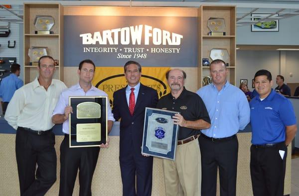 Bartow Ford receiving our 16th President's Award for satisfaction and our 27th Top 100 Club Award present by John Felice