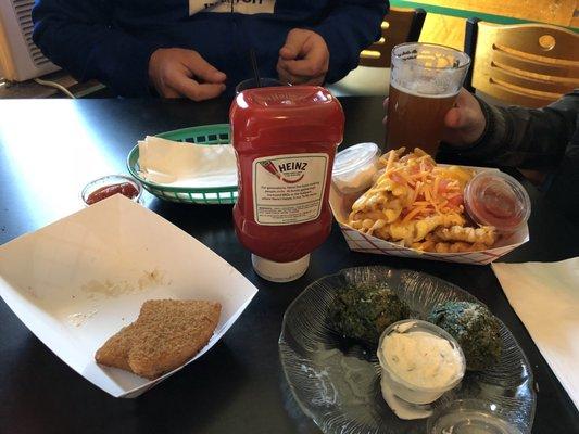 Mozzarella bites, spinach balls and nacho fries