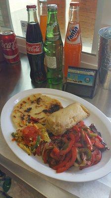 Trio Imperial, is the house dish with a taste of 3 different food pupusa, Salvadoran tamal and one steak with sated vegetables.