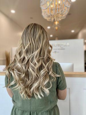 Cool blonde balayage and layered haircut done by Eyerimm