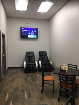 Lounge with Large screen TVs and Massage Chairs