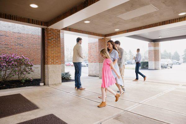 Family walking into church