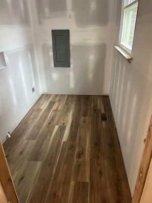 Complete room renovation (flooring, drywall, electrical, window) by Roar Construction