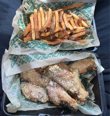 Garlic parm & cajun fries