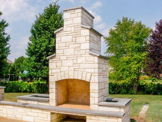 Outdoor Fireplace with stone veneer