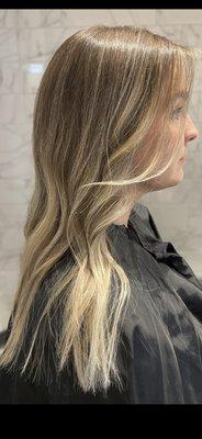 Cool blonde balayage with root melt