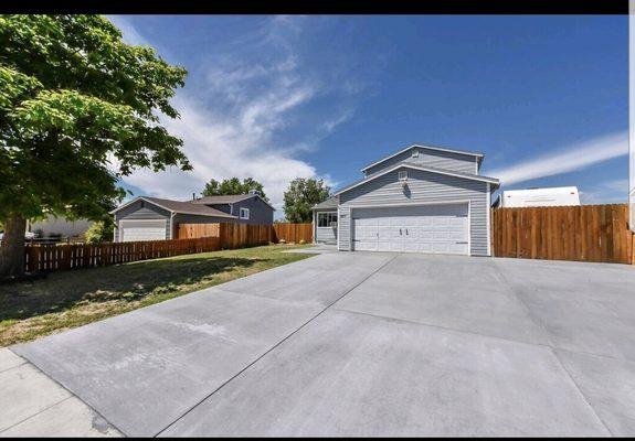 Finished product! New porch, extended driveway and concrete behind the gate. 25yards total.