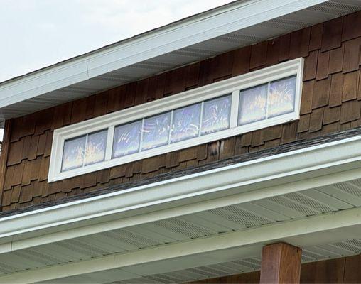 Right on the front of our home so high no one has touched it except window cleaners. All of that smudging is between the glass.