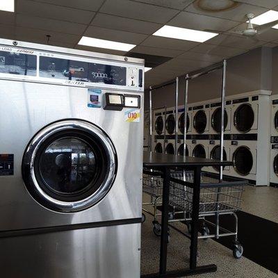 Plenty of washers, top and front loading, of various size load capacity; plenty of dryers.