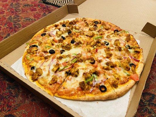 Chicken Tikka Masala Pizza - looks good but totally dry with very little sauce and flavor.