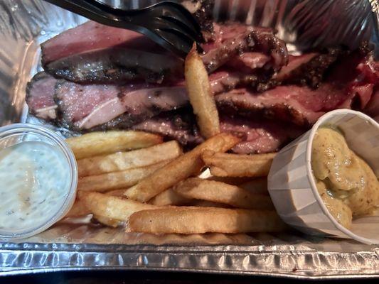 Thick cut half pound of Pastrami and French fries with excellent mustard