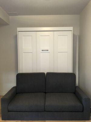 Murphy bed with couch.