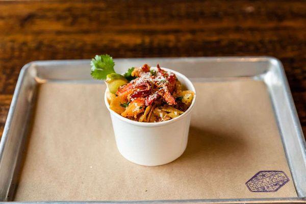 Seafood Mac - Smoked Gouda, Lobster, Pico, Chives and Cotija Cheese.  Our signature dish!